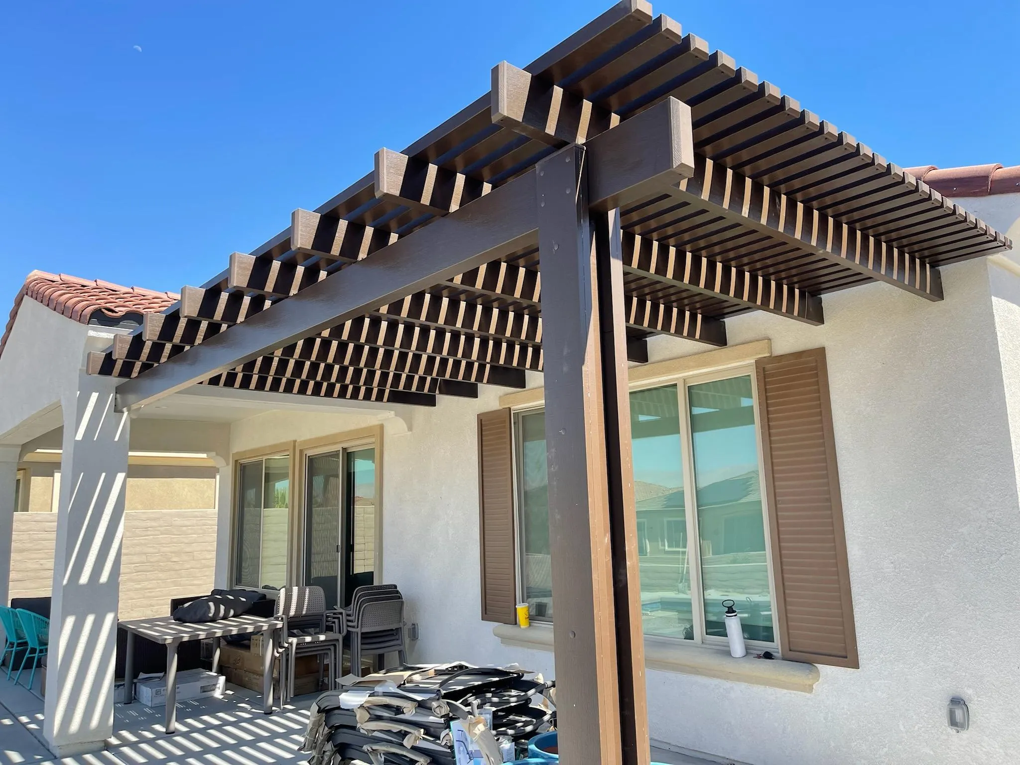 Duralum attached aluminum pergola for an Allen, TX backyard