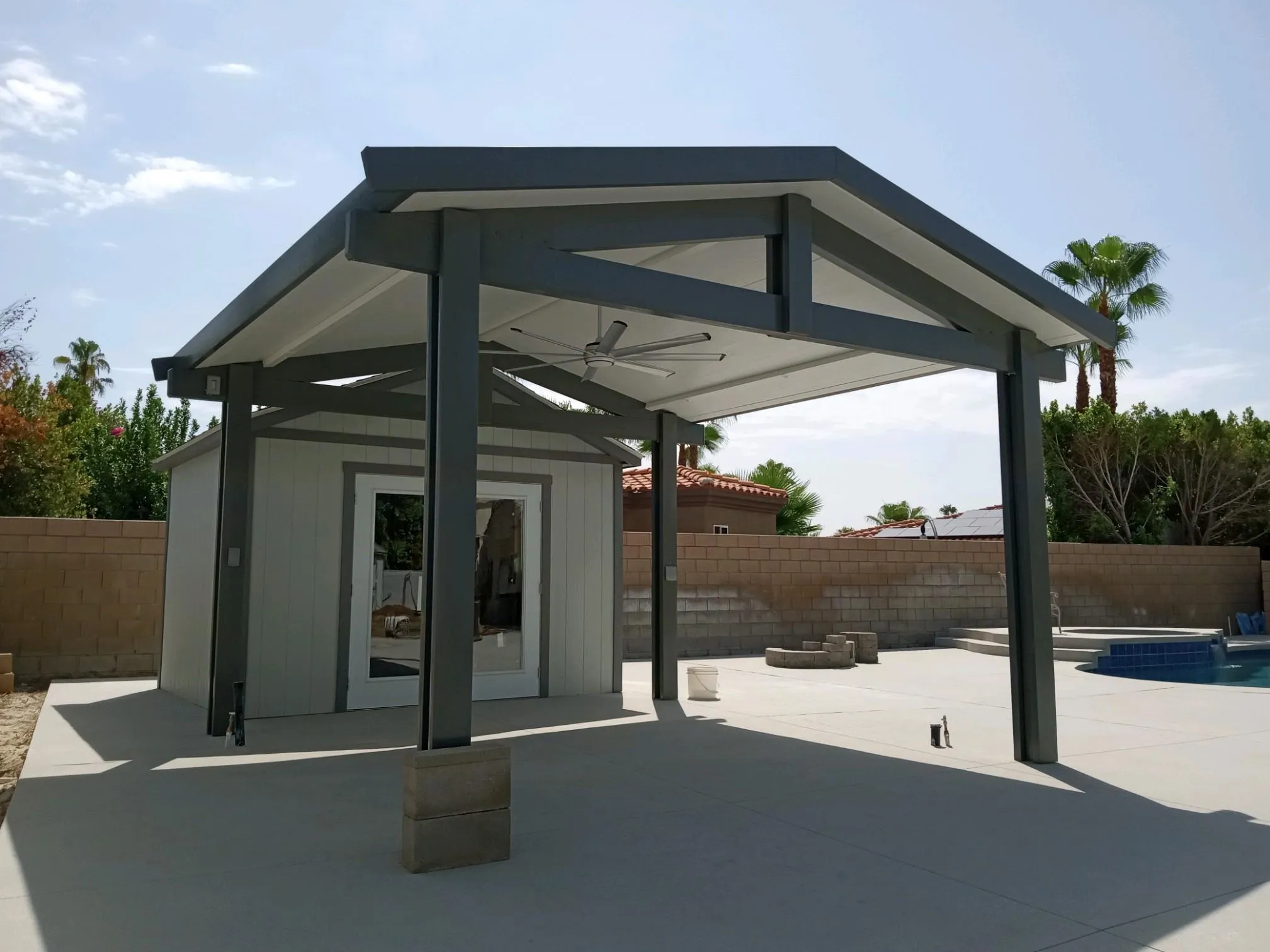 Duralum insulated gable roof with ceiling fan for a patio